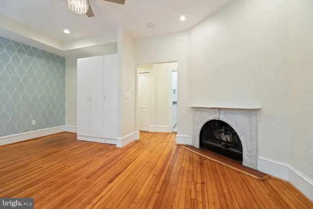 a view of backyard with a deck and furniture