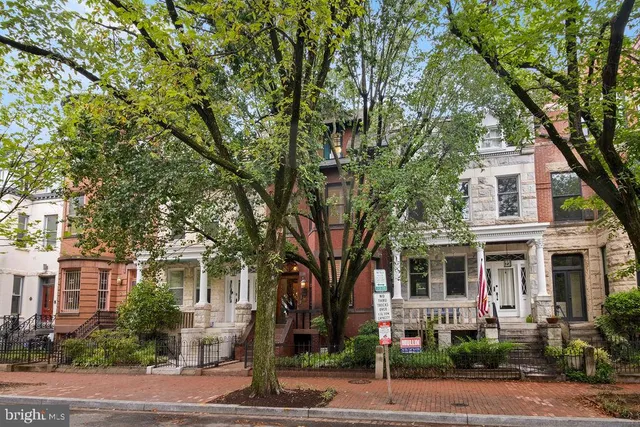 a view of living room with furniture and floor