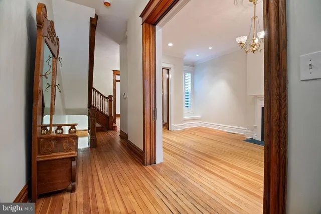 a view of entryway with wooden floor