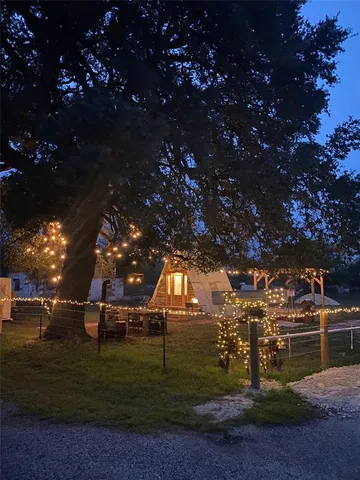 a view of yard with swimming pool