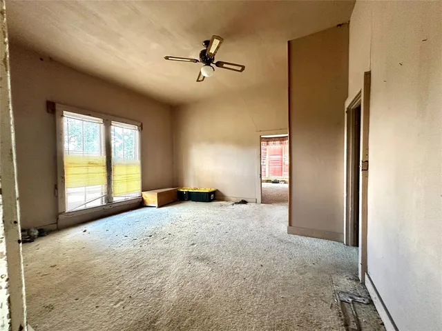 a big room with windows and closet