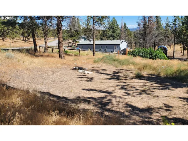 a view of a swimming pool with an ocean view