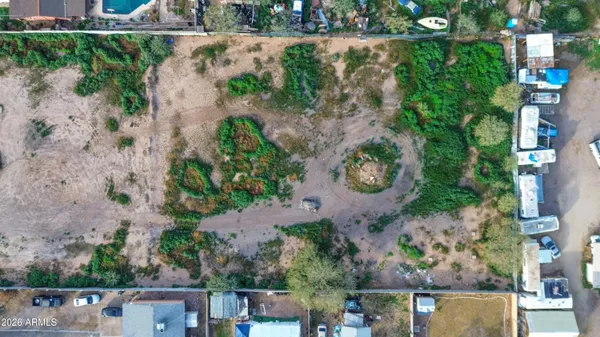 an aerial view of house with yard