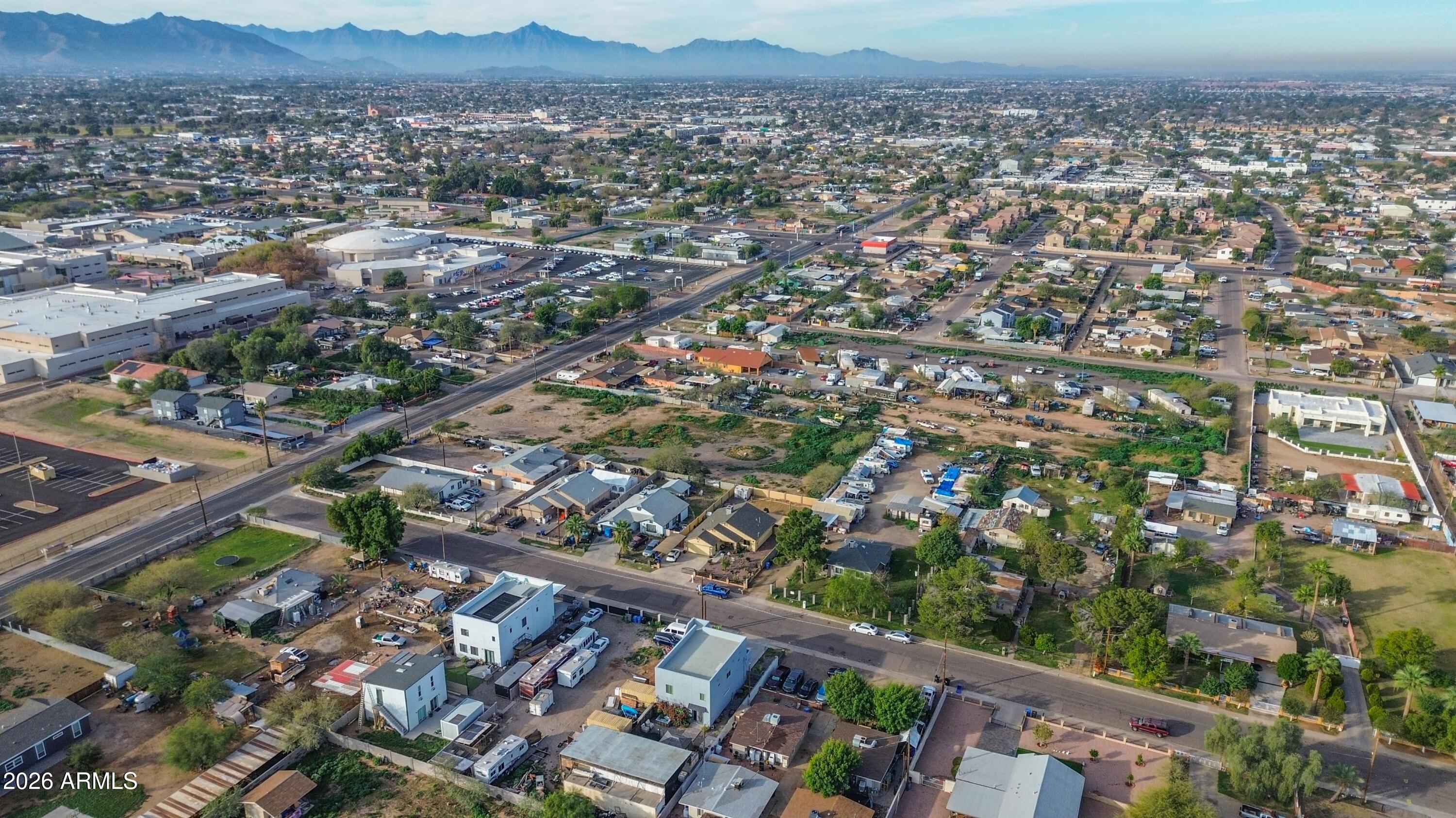 832 East Roeser Road Phoenix, AZ 85040 - Photo 8 of 47 an aerial view of residential houses with city view