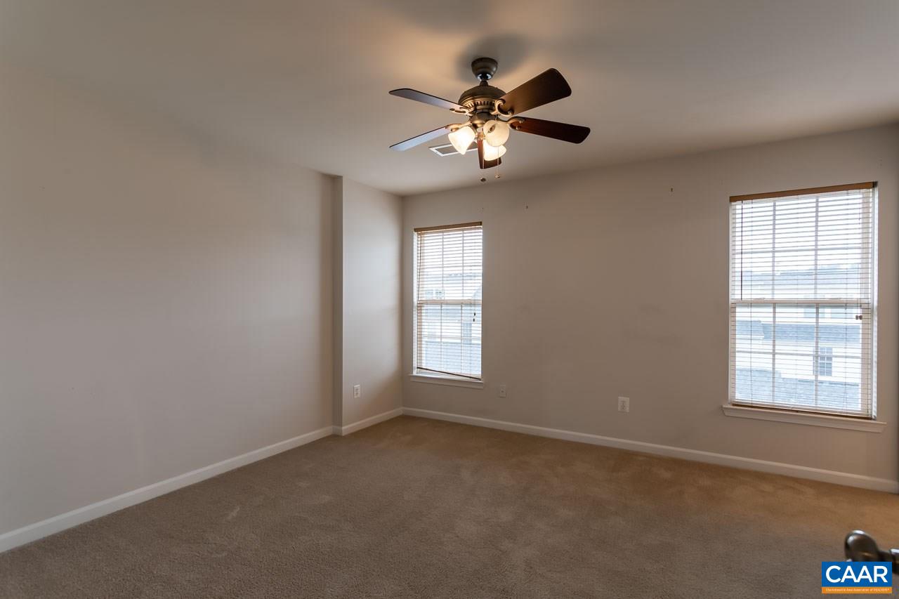 325 Rolkin Road Charlottesville, VA 22911 - Photo 16 of 32 a view of a livingroom with a ceiling fan and window