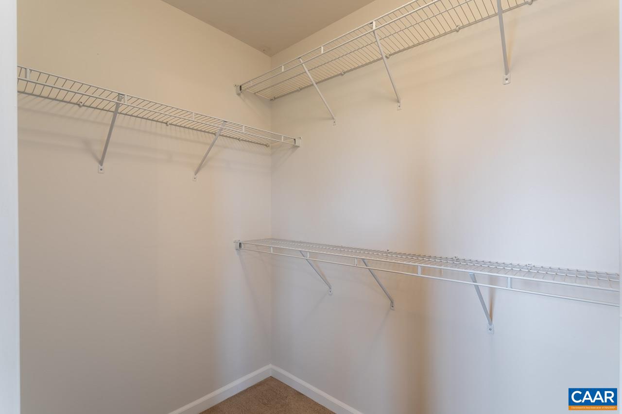 325 Rolkin Road Charlottesville, VA 22911 - Photo 25 of 32 a view of a room with racks on the wall