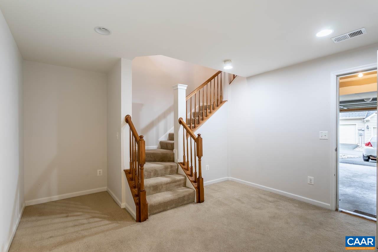 325 Rolkin Road Charlottesville, VA 22911 - Photo 29 of 32 a view of entryway and hall with a chair