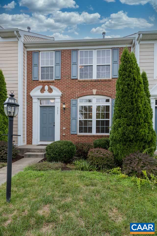 325 Rolkin Road Charlottesville, VA 22911 - Photo 3 of 32 a front view of a house with a yard