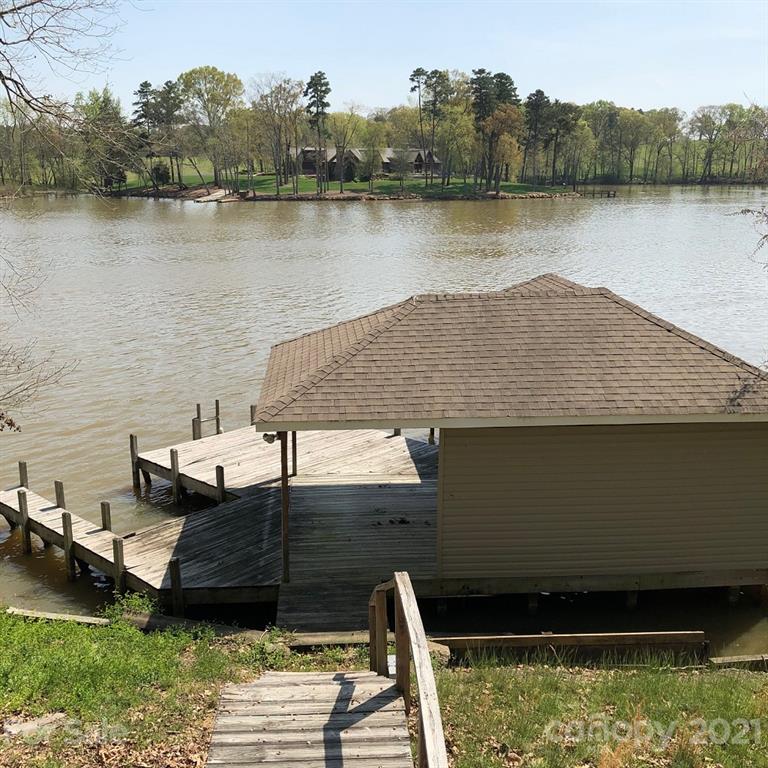 22382 Oakwood Road Albemarle, NC 28001 - Photo 2 of 21 a view of a lake with a mountain in the background
