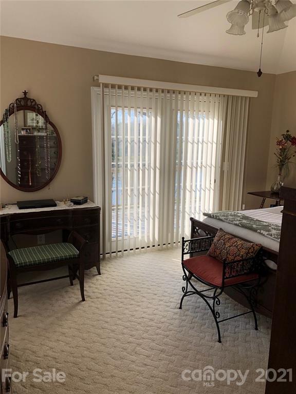 22382 Oakwood Road Albemarle, NC 28001 - Photo 16 of 21 a living room with furniture and a window