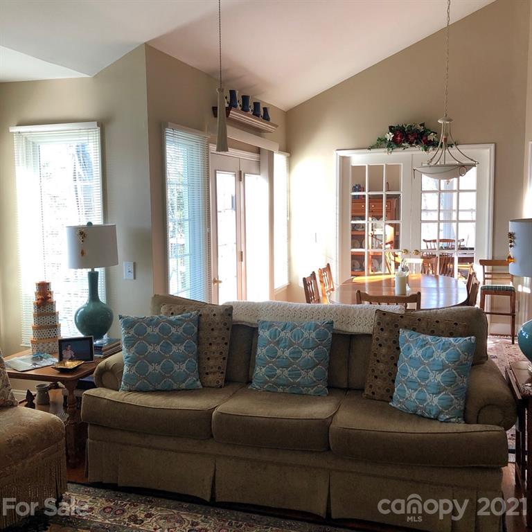 22382 Oakwood Road Albemarle, NC 28001 - Photo 4 of 21 a living room with furniture and a large window