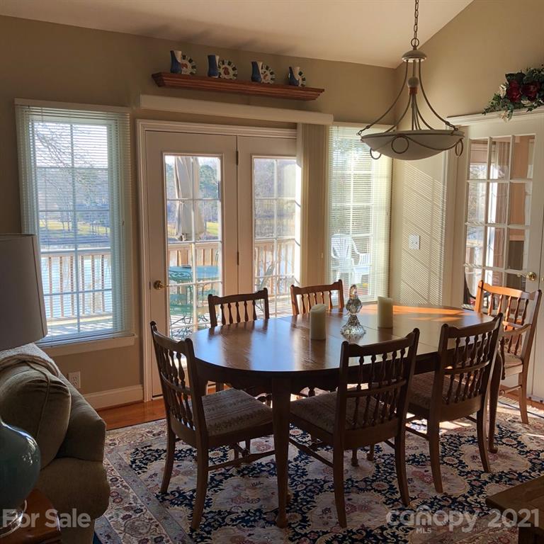 22382 Oakwood Road Albemarle, NC 28001 - Photo 8 of 21 a view of a dining room with furniture window and outside view