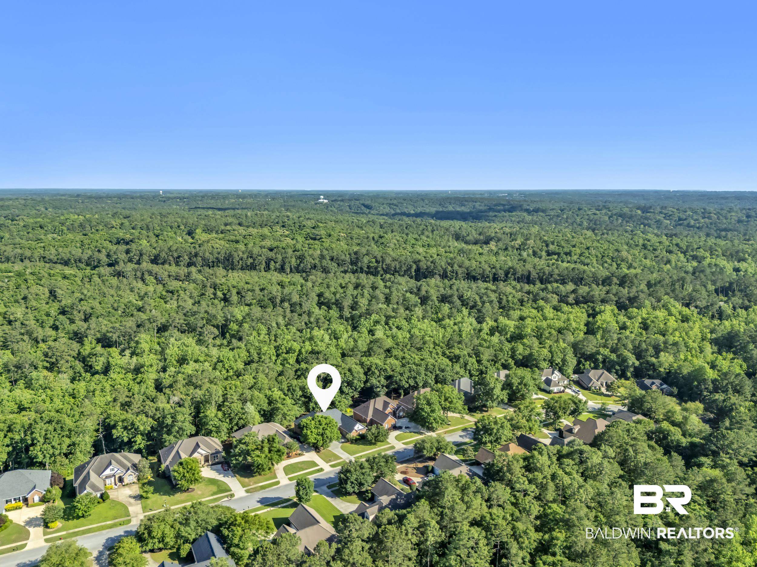 8137 Pine Run Daphne, AL 36527 - Photo 53 of 67 Aerial perspective showcasing a residential neighborhood surrounded by extensive natural woodland