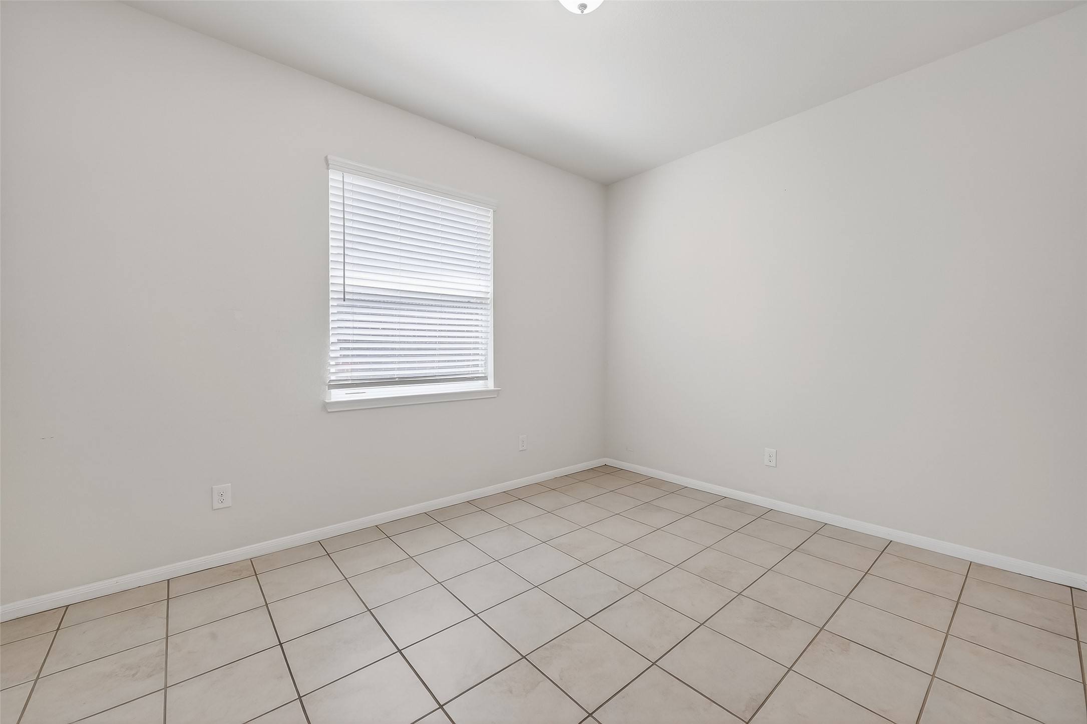 7631 Granite Terrace Lane Houston, TX 77083 - Photo 26 of 46 a view of an empty room and window
