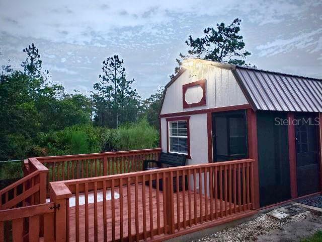 20805 Sheldon Street Orlando, FL 32833 - Photo 2 of 18 a view of a wooden fence and a pathway