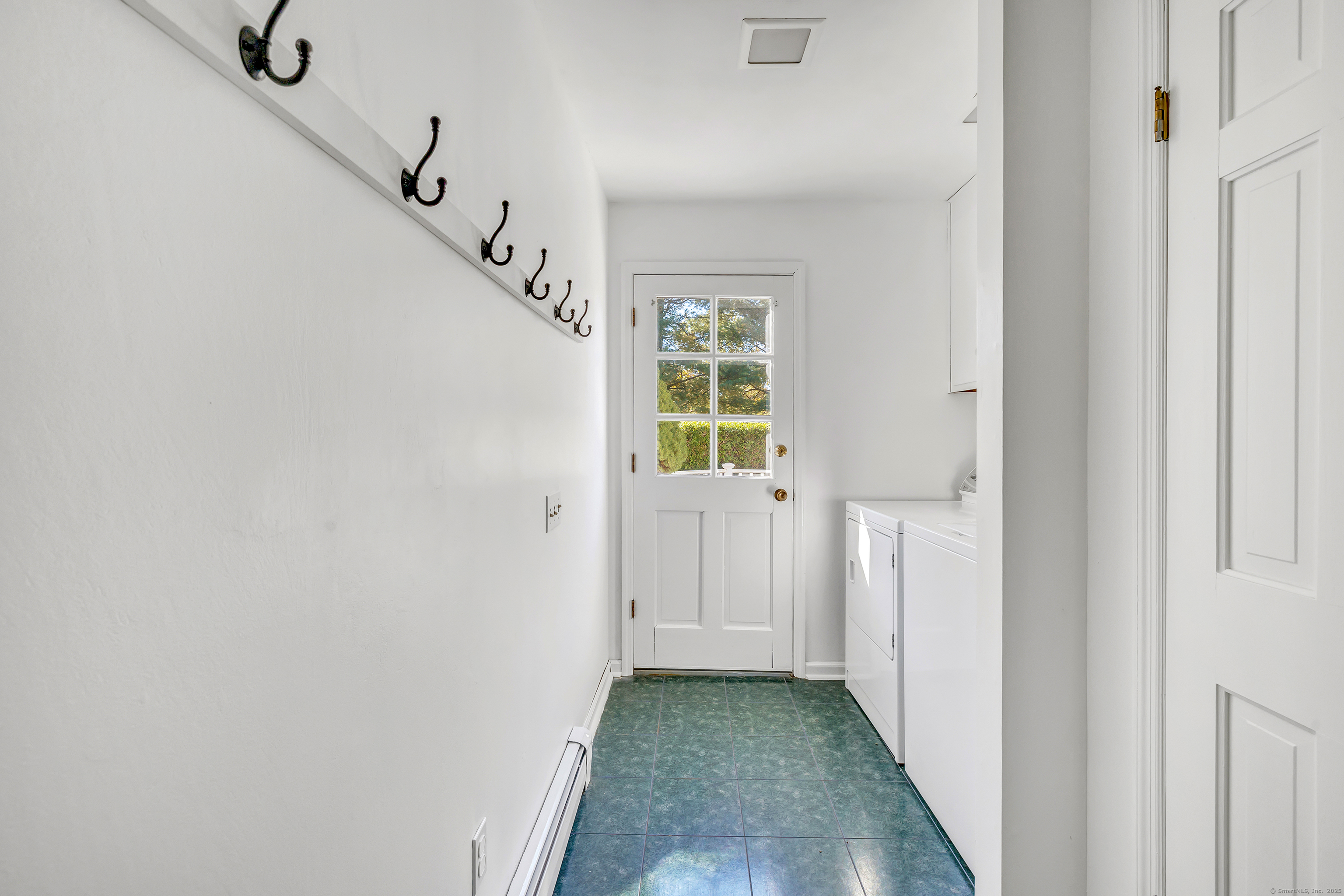 41 Butternut Lane Fairfield, CT 06890 - Photo 17 of 33 a view of an entryway with wooden floor