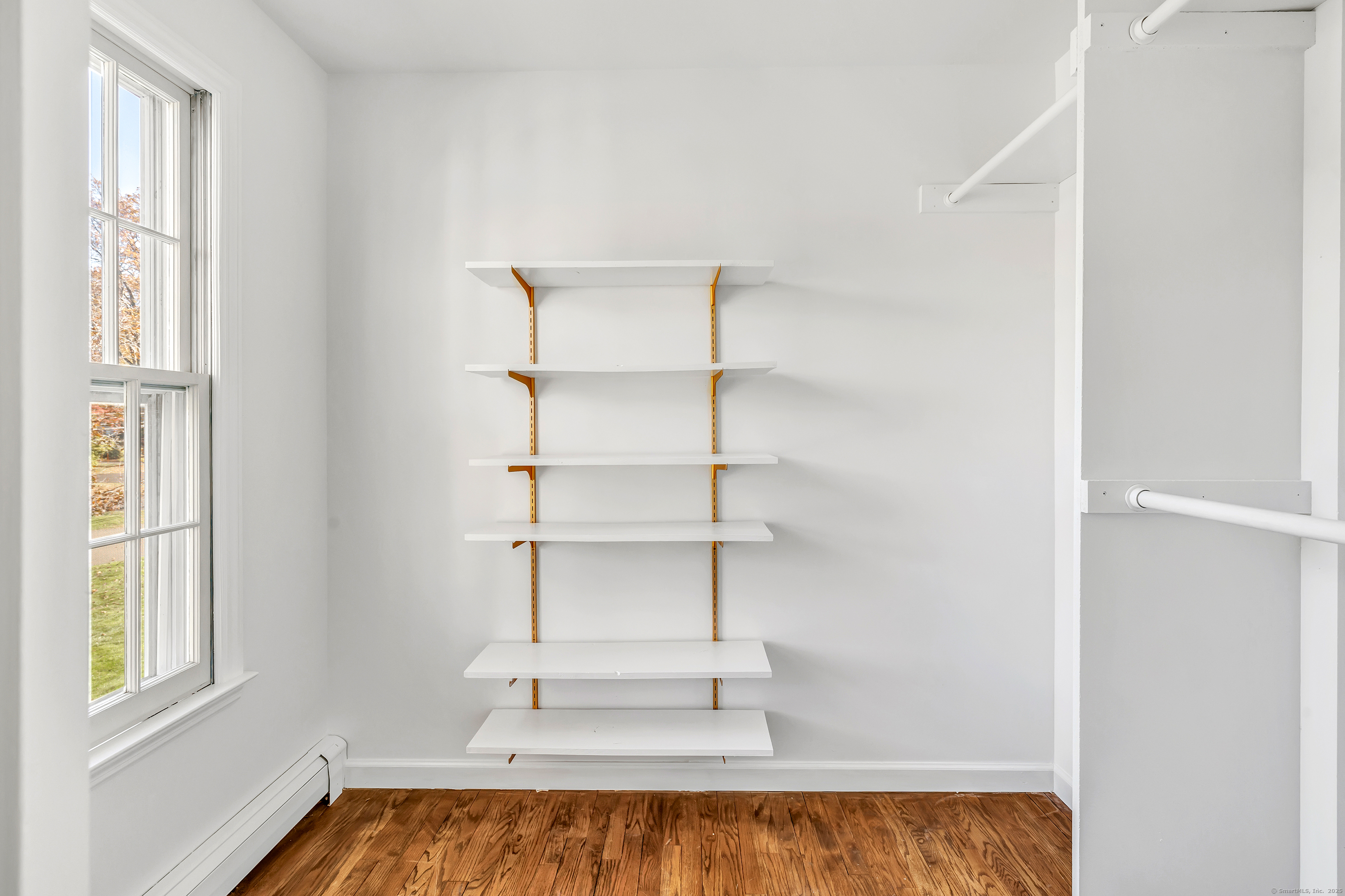41 Butternut Lane Fairfield, CT 06890 - Photo 26 of 33 a bathroom with a window