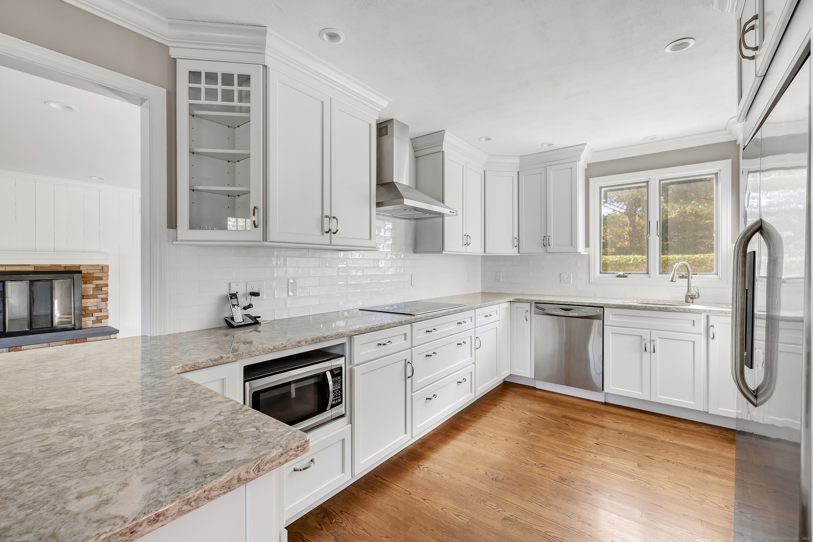 41 Butternut Lane Fairfield, CT 06890 - Photo 5 of 33 a kitchen with stainless steel appliances granite countertop a stove a sink and a granite counter tops