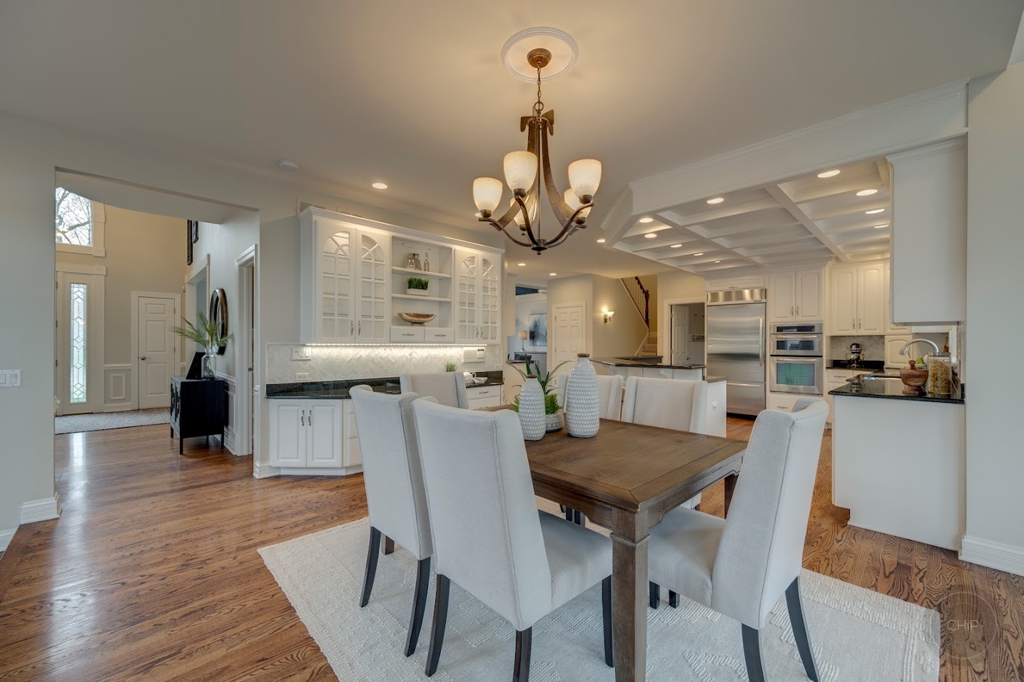 208 Crooked Tree Court Naperville, IL 60565 - Photo 19 of 97 a view of a dining room with furniture and wooden floor