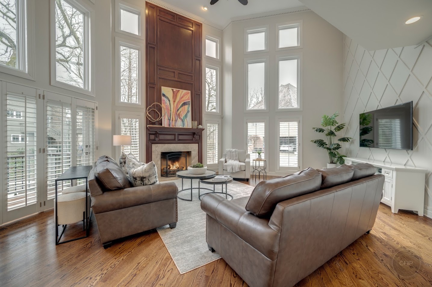 208 Crooked Tree Court Naperville, IL 60565 - Photo 22 of 97 a living room with fireplace furniture and a flat screen tv