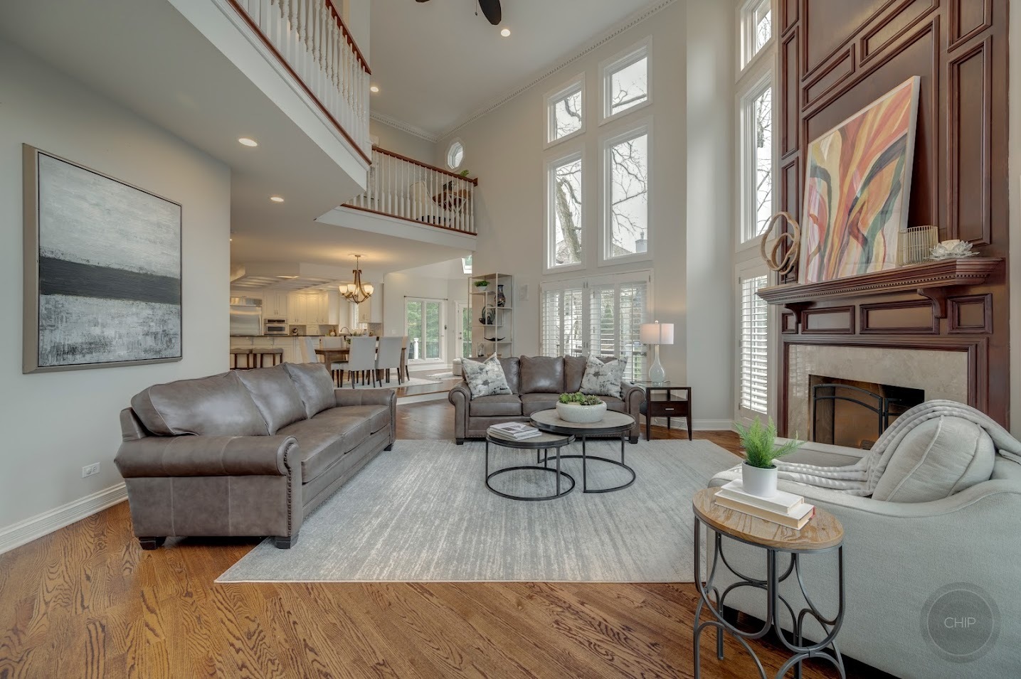 208 Crooked Tree Court Naperville, IL 60565 - Photo 23 of 97 a living room with furniture fireplace and a large window