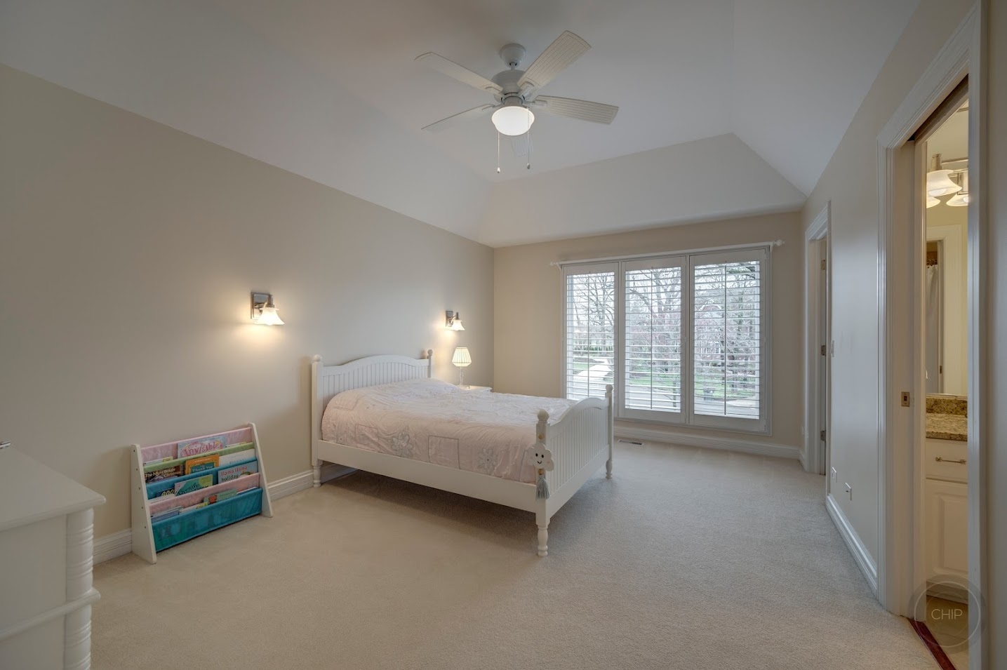 208 Crooked Tree Court Naperville, IL 60565 - Photo 55 of 97 a spacious bedroom with a bed and a chandelier