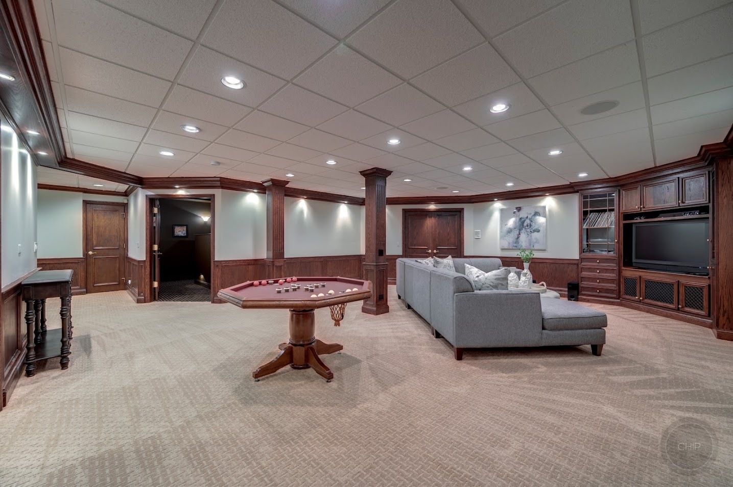 208 Crooked Tree Court Naperville, IL 60565 - Photo 69 of 97 a living room with furniture and a flat screen tv