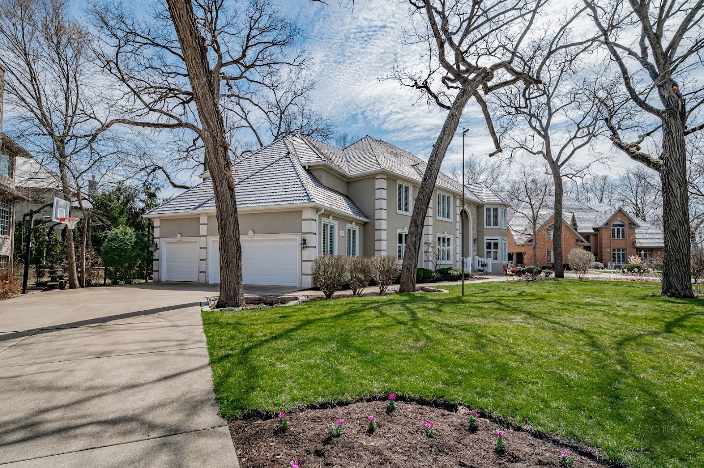 208 Crooked Tree Court Naperville, IL 60565 - Photo 87 of 97 a front view of a house with a garden and trees