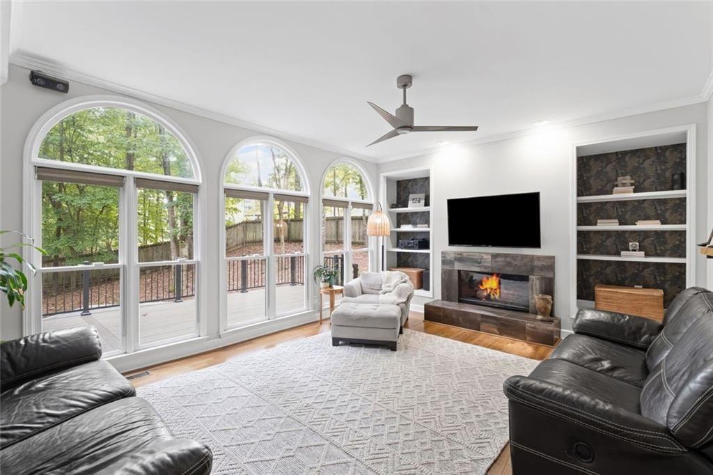 475 Laurian View Court Roswell, GA 30075 - Photo 18 of 66 a living room with furniture and a flat screen tv