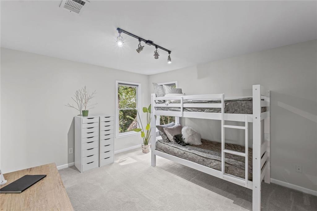 475 Laurian View Court Roswell, GA 30075 - Photo 34 of 66 a bedroom with furniture and white walls