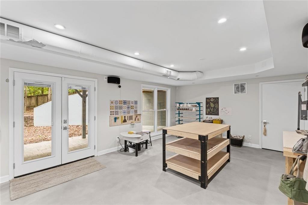 475 Laurian View Court Roswell, GA 30075 - Photo 37 of 66 a bed room with a bed and a chair