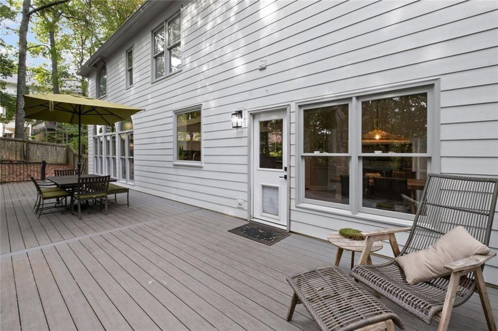 475 Laurian View Court Roswell, GA 30075 - Photo 45 of 66 a backyard of a house with seating space