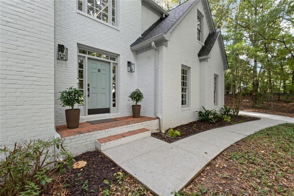475 Laurian View Court Roswell, GA 30075 - Photo 5 of 66 a front view of a house with a yard