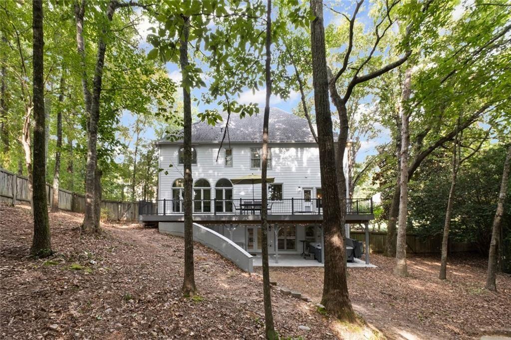 475 Laurian View Court Roswell, GA 30075 - Photo 52 of 66 a view of a house with backyard and trees