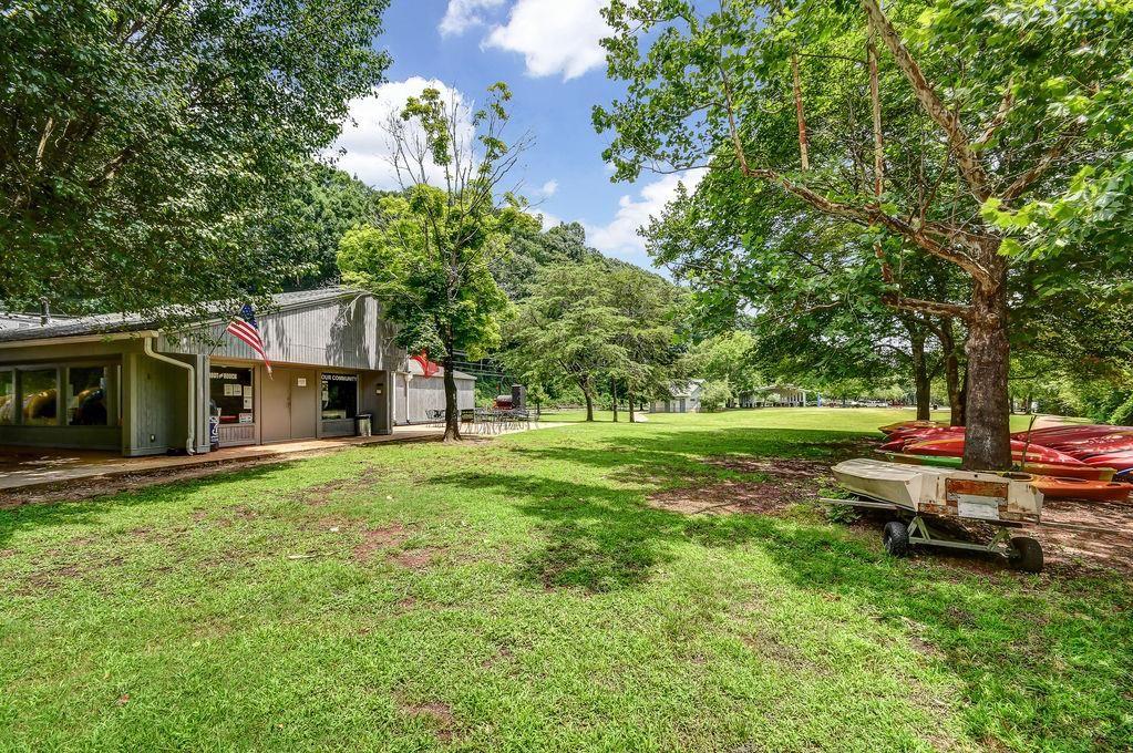475 Laurian View Court Roswell, GA 30075 - Photo 59 of 66 a house view with a sitting space and garden