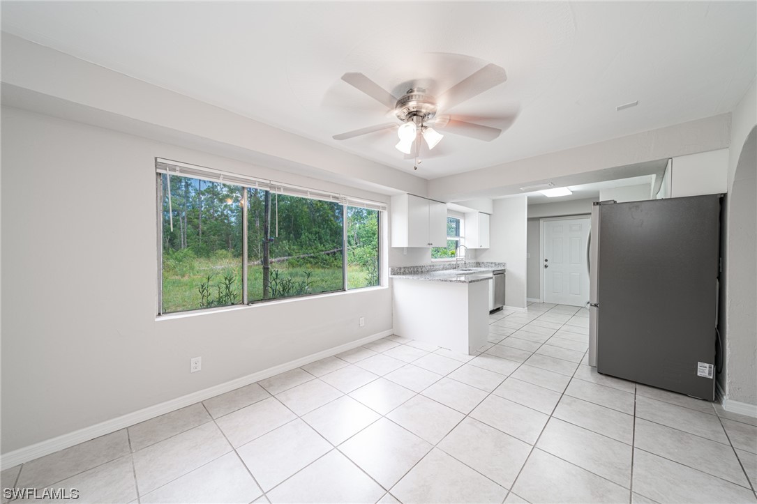 12451 Shawnee Road Fort Myers, FL 33913 - Photo 15 of 39 a view of kitchen with windows and refrigerator