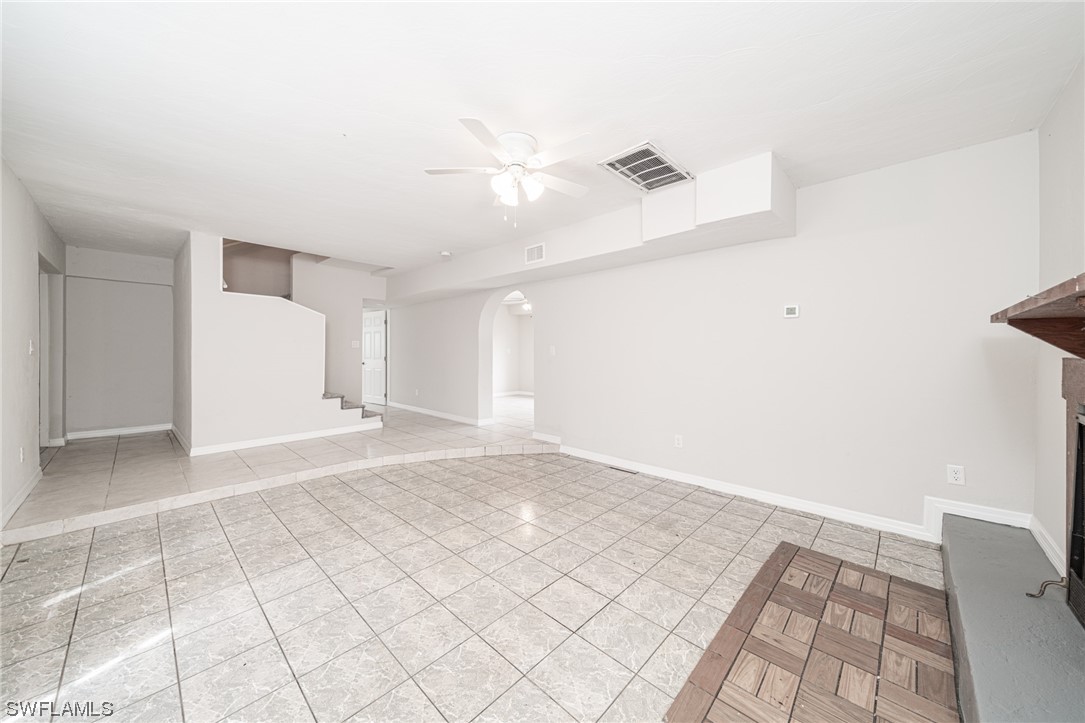 12451 Shawnee Road Fort Myers, FL 33913 - Photo 17 of 39 a view of a livingroom with white walls