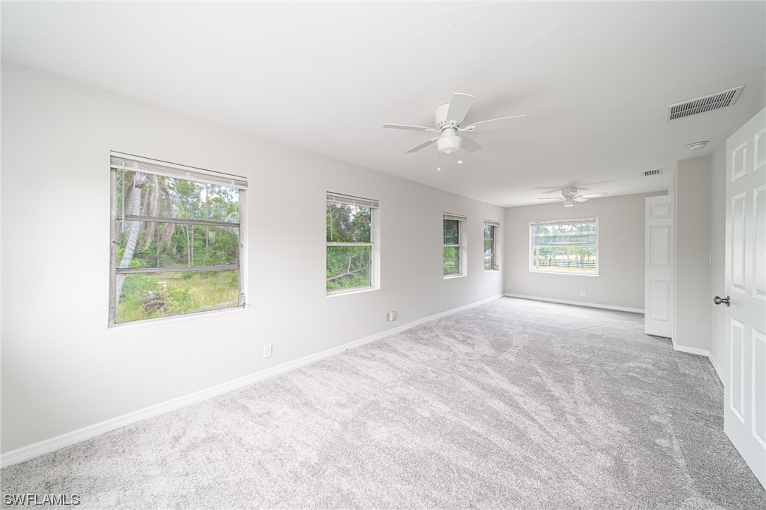 12451 Shawnee Road Fort Myers, FL 33913 - Photo 26 of 39 a view of an empty room with a window