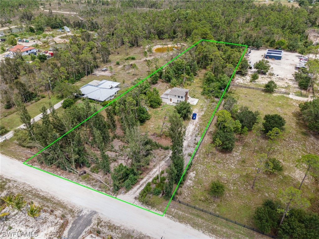 12451 Shawnee Road Fort Myers, FL 33913 - Photo 38 of 39 an aerial view of residential house with outdoor space