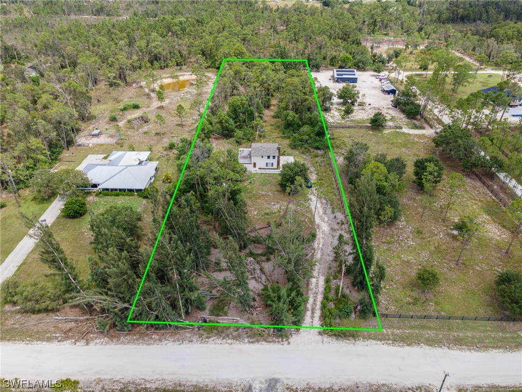 12451 Shawnee Road Fort Myers, FL 33913 - Photo 39 of 39 an aerial view of residential house with outdoor space