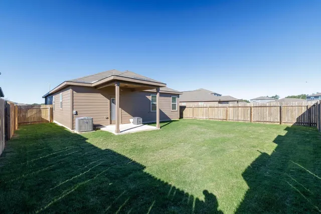 a view of a swimming pool with a garden