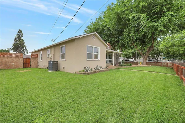 a house view with a garden space