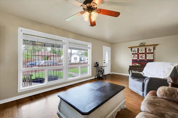 a living room with furniture and a window