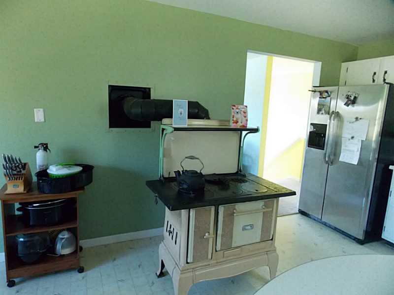 259 Toddy Pond Road Surry, ME 04684 - Photo 4 of 28 Kitchen. with working wood cook stove