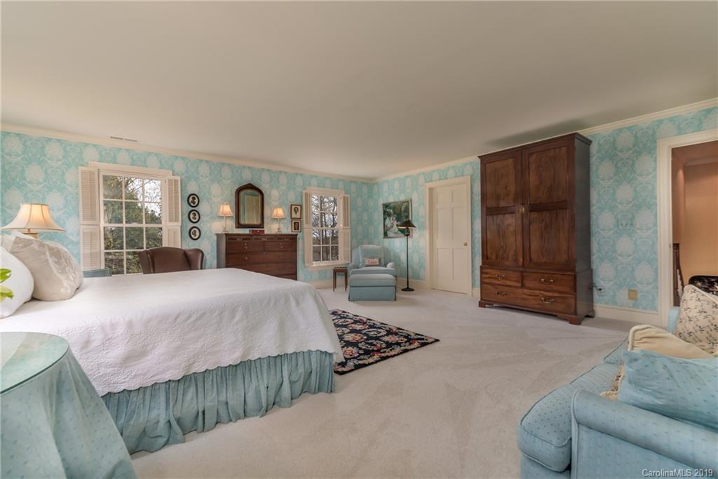 834 New Hope Road Rutherfordton, NC 28139 - Photo 22 of 35 a bedroom with a large bed and a couch
