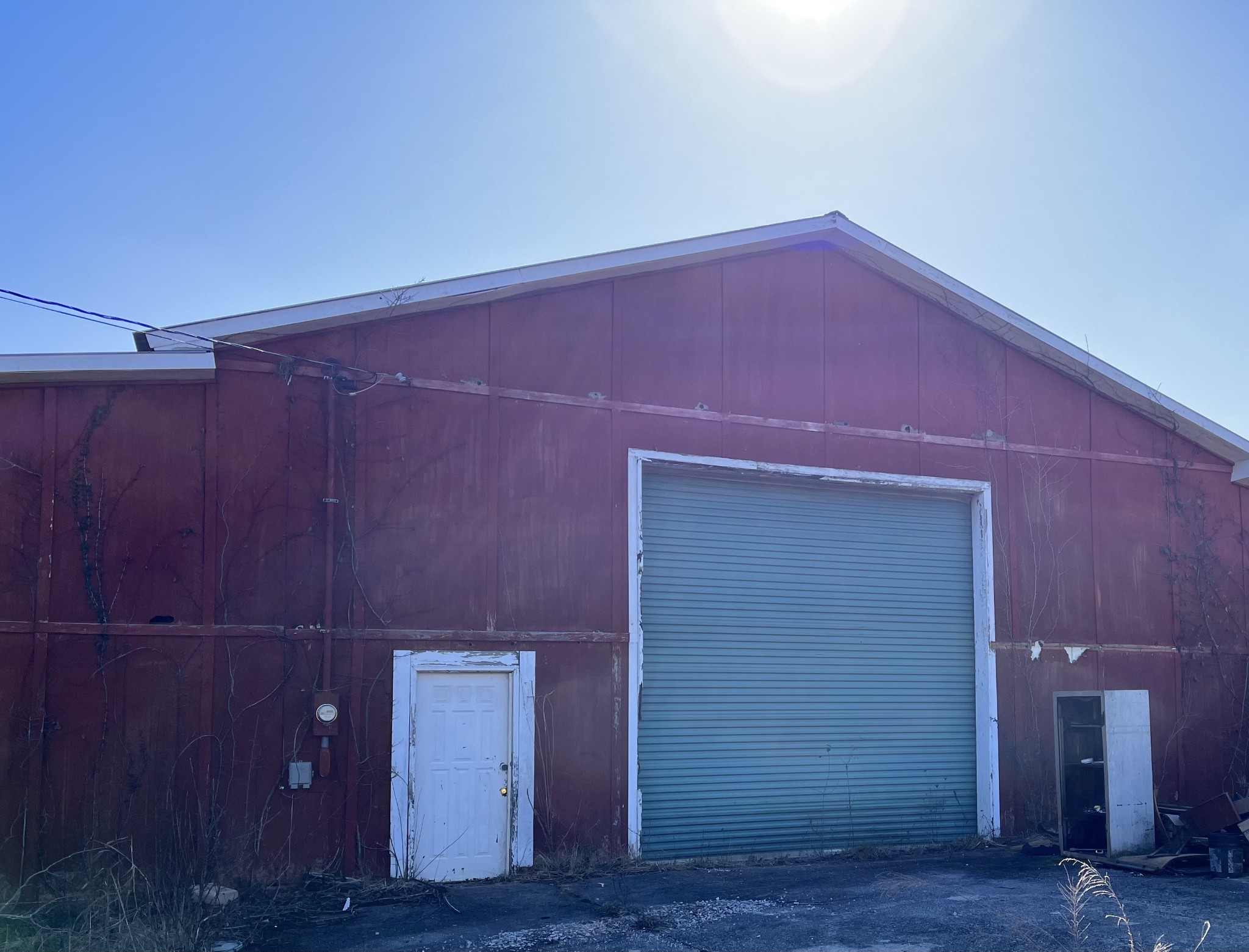 355 Wells Street Monteagle, TN 37356 - Photo 1 of 12 a view of empty room with wooden floor and entryway