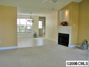 3613 Old Camden Road Monroe, NC 28110 - Photo 3 of 8 a view of livingroom and fireplace
