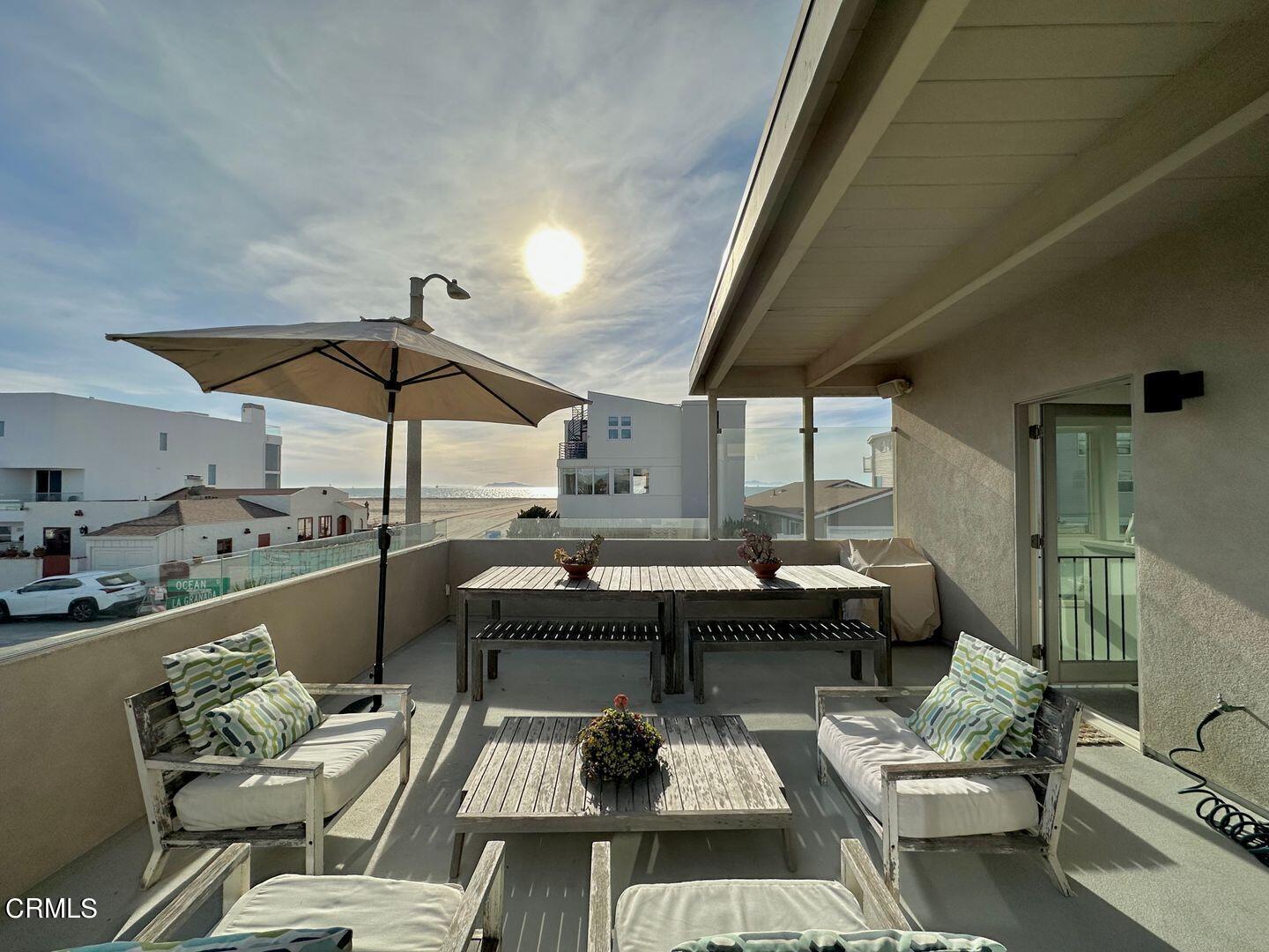 3600 Ocean Drive Oxnard, CA 93035 - Photo 18 of 36 a living room with furniture and white walls