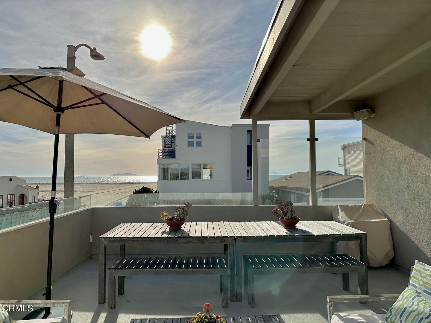 3600 Ocean Drive Oxnard, CA 93035 - Photo 19 of 36 a living room with table and chairs