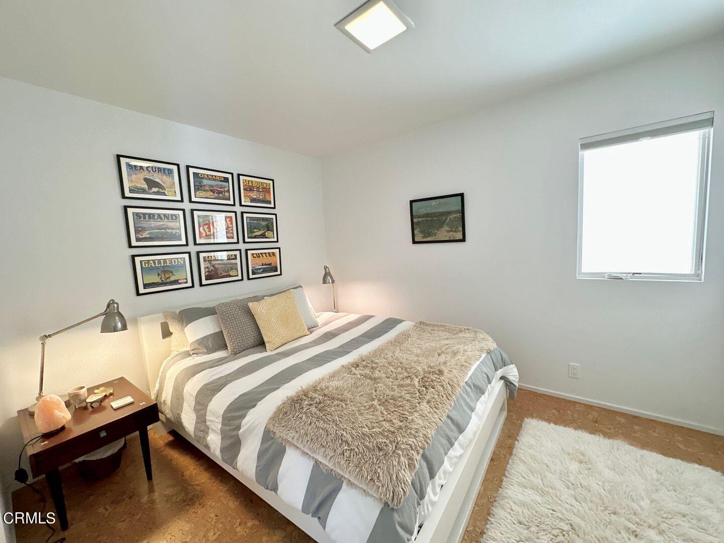 3600 Ocean Drive Oxnard, CA 93035 - Photo 22 of 36 a bedroom with a bed and a window